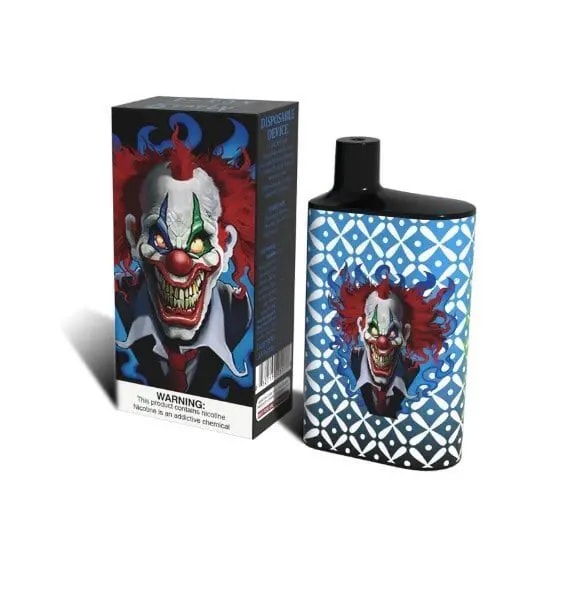 A disposable vape device with packaging featuring an illustration of an evil clown with red hair, sharp teeth, and a sinister expression.