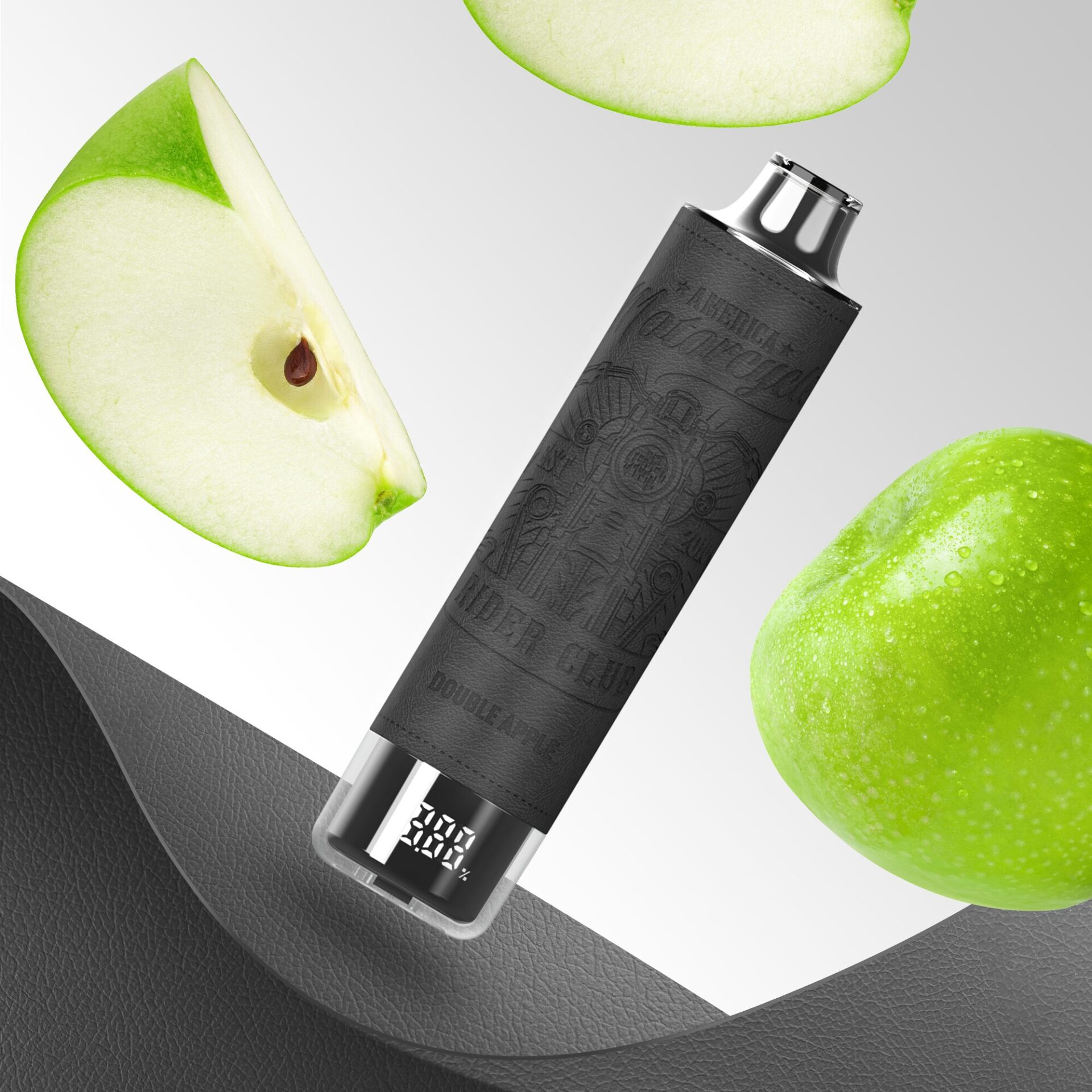 A sleek black vape device with engraved patterns, a digital display, and a metallic tip, surrounded by vibrant green apple slices on a light gradient background.