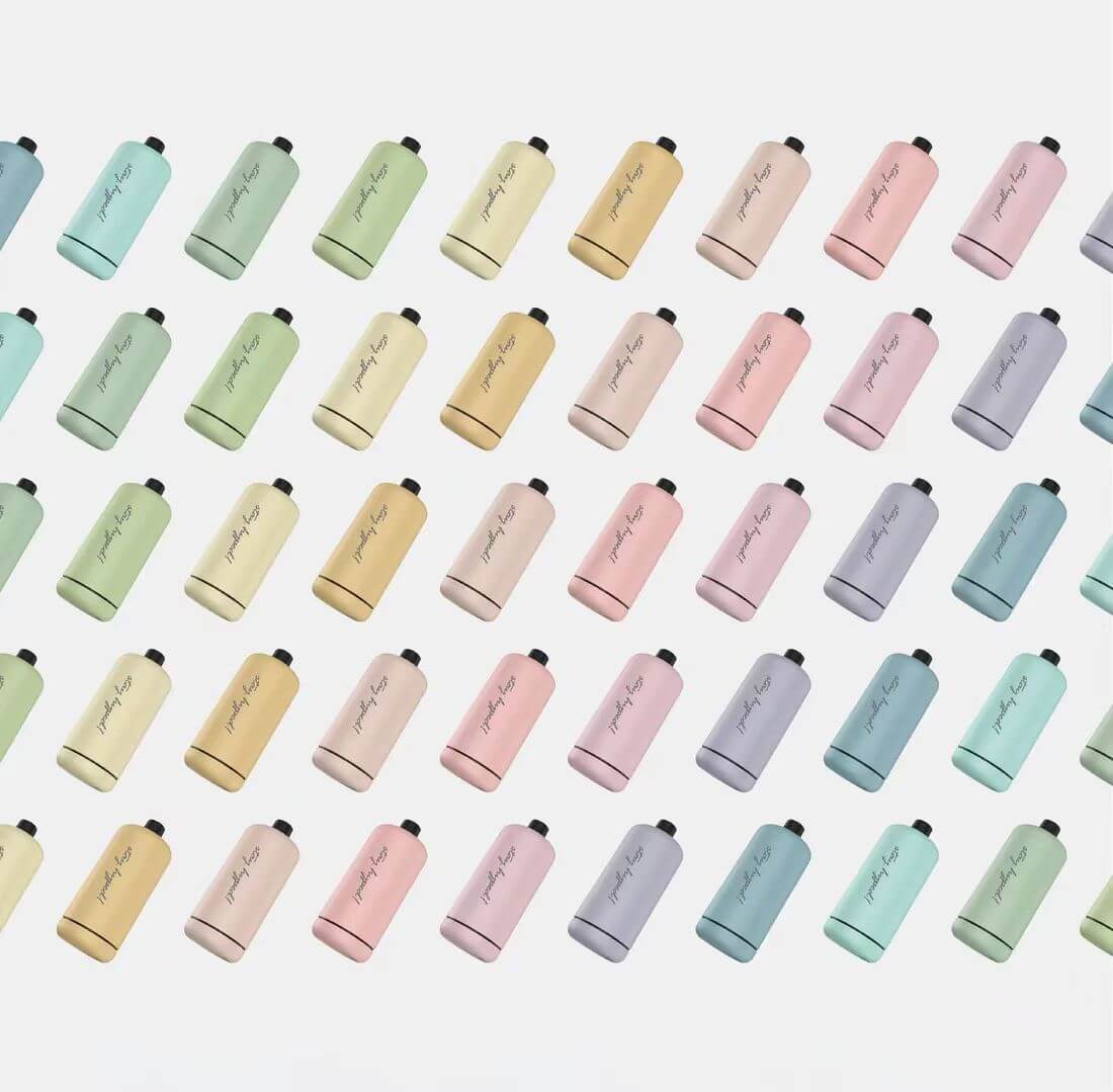 A pattern of pastel-colored reusable bottles arranged diagonally on a white background.