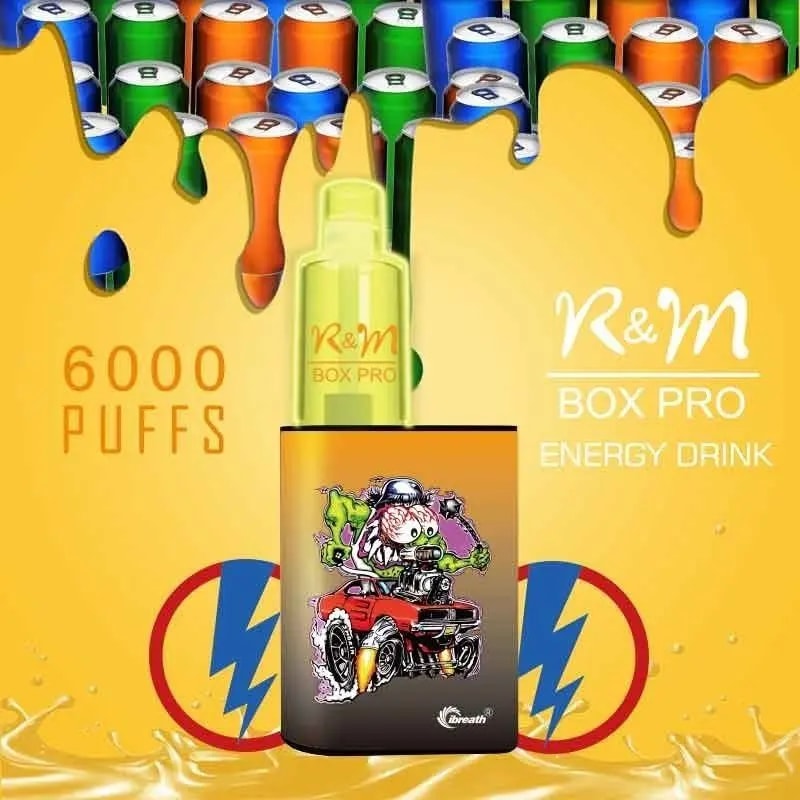A colorful vape device labeled "R&M Box Pro Energy Drink" with 6000 puffs, featuring vibrant artwork of a cartoon character driving a red car, set against a background of energy drink cans and yellow liquid splashes.