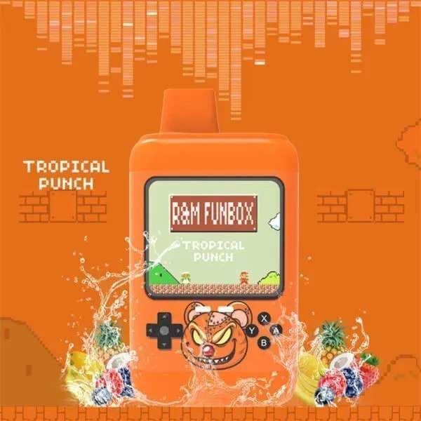 "R&M Funbox disposable vape device in orange, labeled Tropical Punch, featuring a retro gaming-themed design with a screen, joystick buttons, and a cartoon bear logo, surrounded by splashes of tropical fruits against an orange pixelated background."