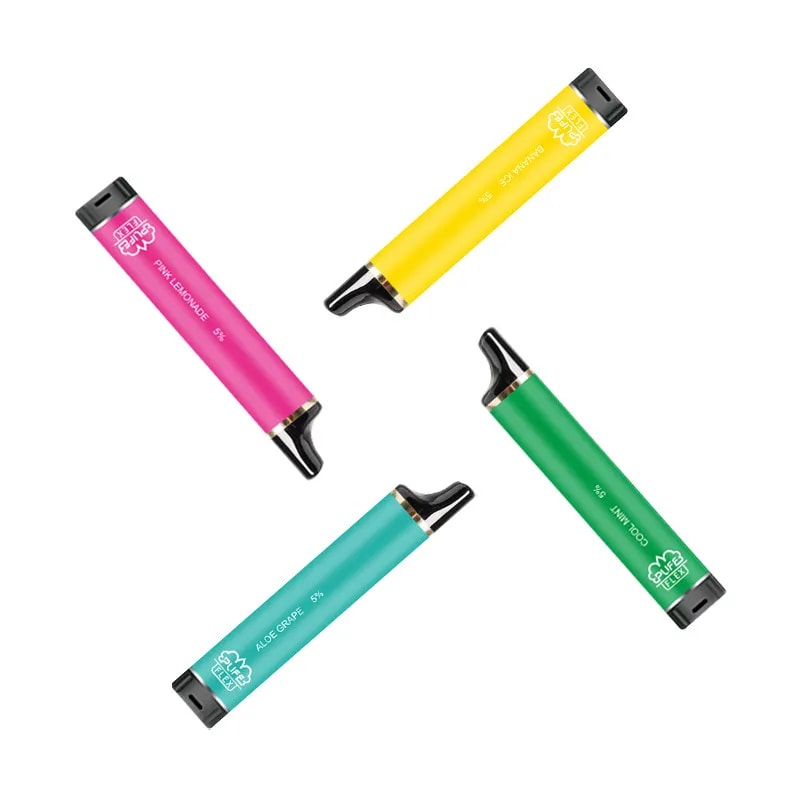 Four colorful vape pens in pink, yellow, green, and blue, arranged diagonally on a white background. Each pen has distinctive flavors labeled on them.
