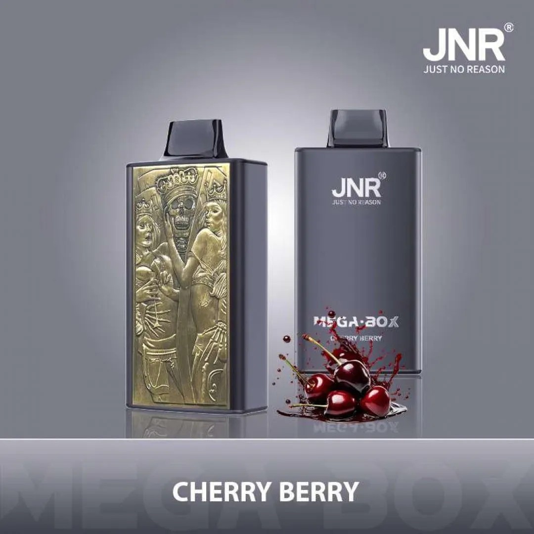 A sleek dark gray vape device with gold engraving on one side, labeled "JNR MEGA-BOX CHERRY BERRY," featuring cherries and juice splashes.