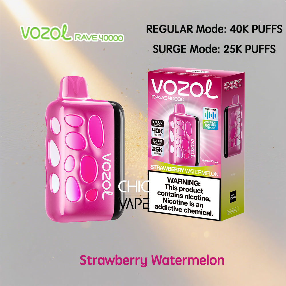 Pink VozoL Rave 40000 disposable vape next to its Strawberry Watermelon box, featuring a rounded panel-like surface on the device and bold branding, with a nicotine warning on the packaging.