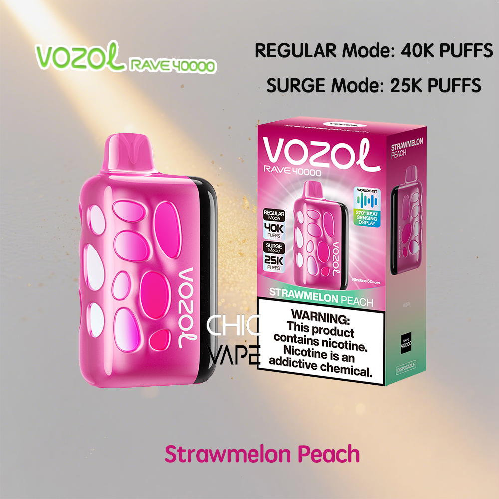 Pink VOZOL RAVE 40000 vaping device beside its Strawmelon Peach flavor box, highlighting a rounded body with pink circular panels and the packaging's details about Regular Mode 40K puffs and Surge Mode 25K puffs, plus the nicotine warning on the box.