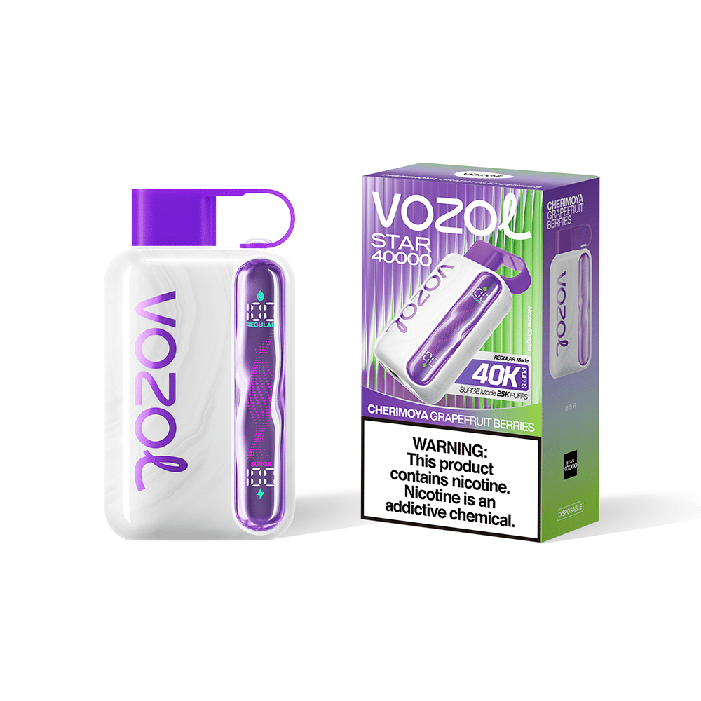 A white VOZOL disposable vape with a purple cap and purple side panel sits beside its purple-to-green box labeled VOZOL Star 40000 with the flavor Cherimoya Grapefruit Berries and a nicotine warning.