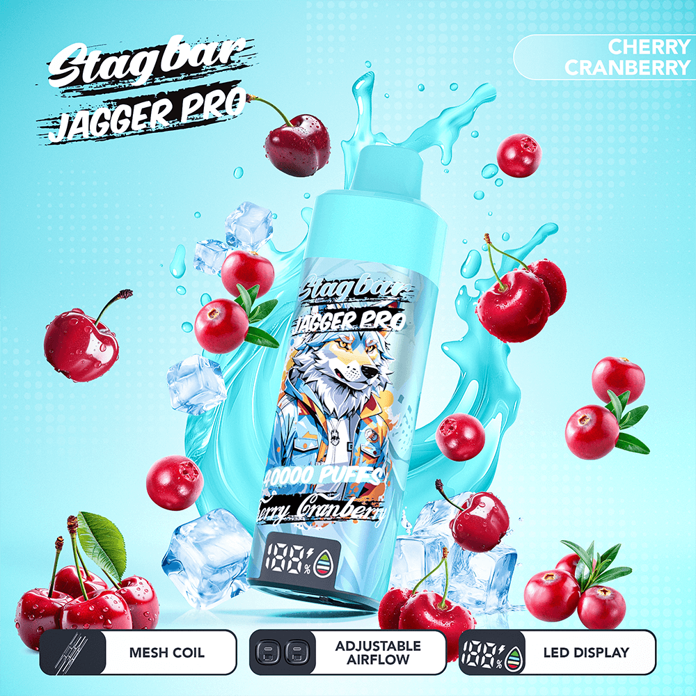 Blue vape bottle labeled Stagbar Jagger Pro with wolf, Cherry Cranberry, LED display, among cherries and ice.