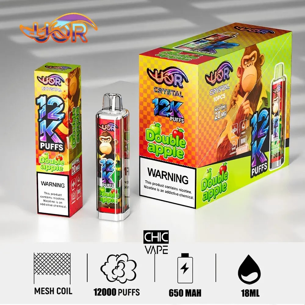 Bright, colorful vape box and device featuring Double Apple flavor, 12K Puffs, and a cartoon monkey illustration.