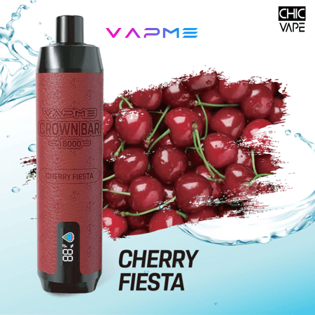 Un dispositivo de vapeo rojo con la etiqueta "Vapme Crown Bar 18000 Cherry Fiesta" se muestra junto a un racimo de cerezas frescas sobre un fondo con temática acuática.
