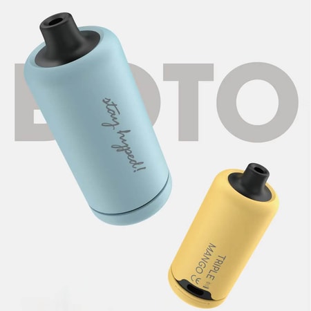 Two colorful cylindrical vape devices, one blue with "stay hyped!" text and one yellow labeled "Triple Mango," both featuring black mouthpieces, displayed on a minimalist background.