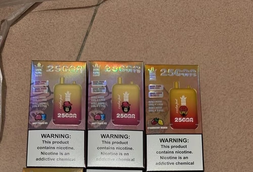Three boxes of Bang King disposable vape devices, each labeled with "25000 puffs," featuring different flavors, with a nicotine warning at the bottom.