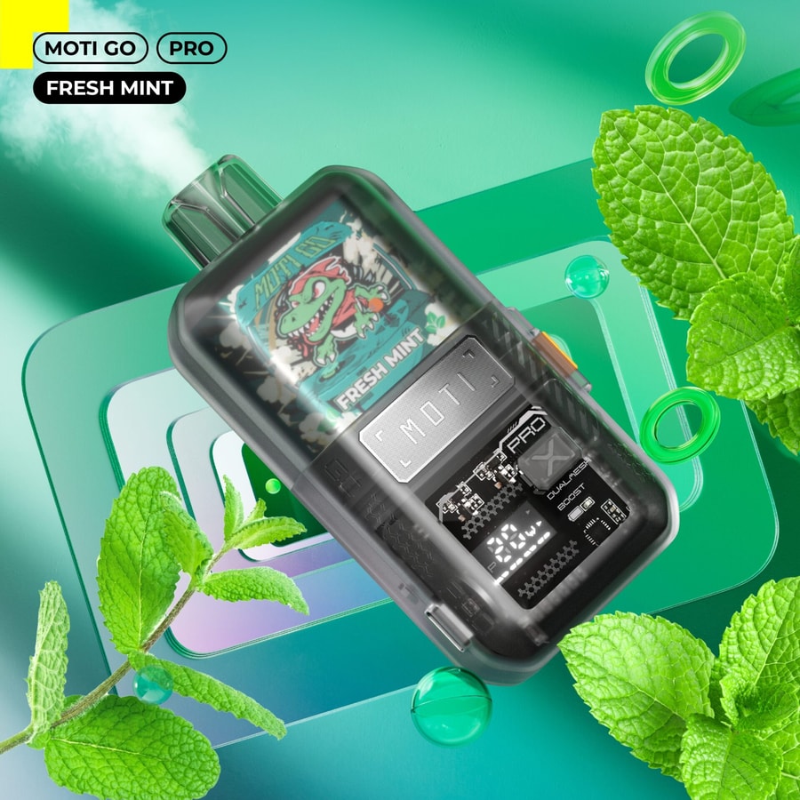 Un dispositivo da svapo nero etichettato "MOTI GO PRO" al gusto "Fresh Mint", con un display digitale e foglie di menta sullo sfondo.